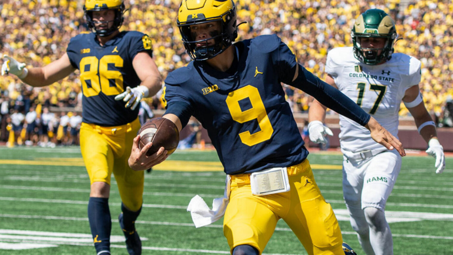 behind-enemy-lines-michigan-buckeye-huddle